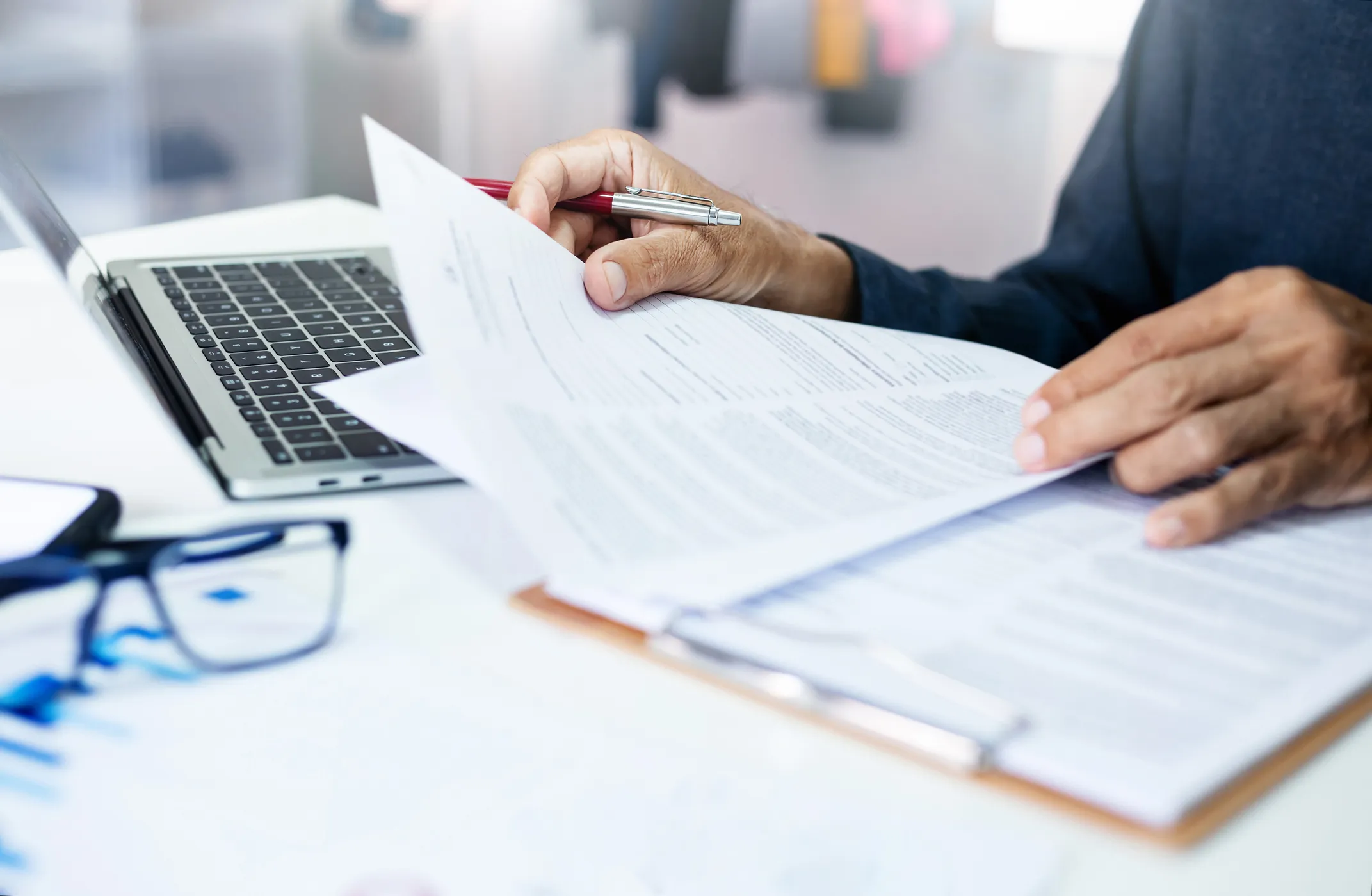 Person signing insurance forms