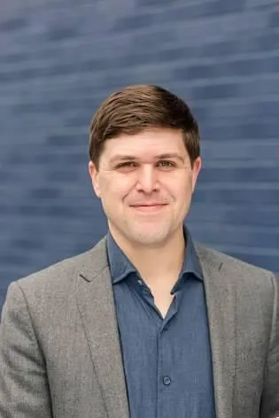 Headshot of Ryan Derousseau